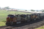 Intermodal train gets ready to overtake a freight